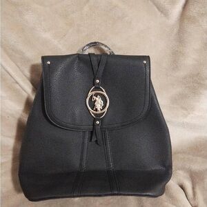 New black Polo mini backpack with gold pendant and tassel